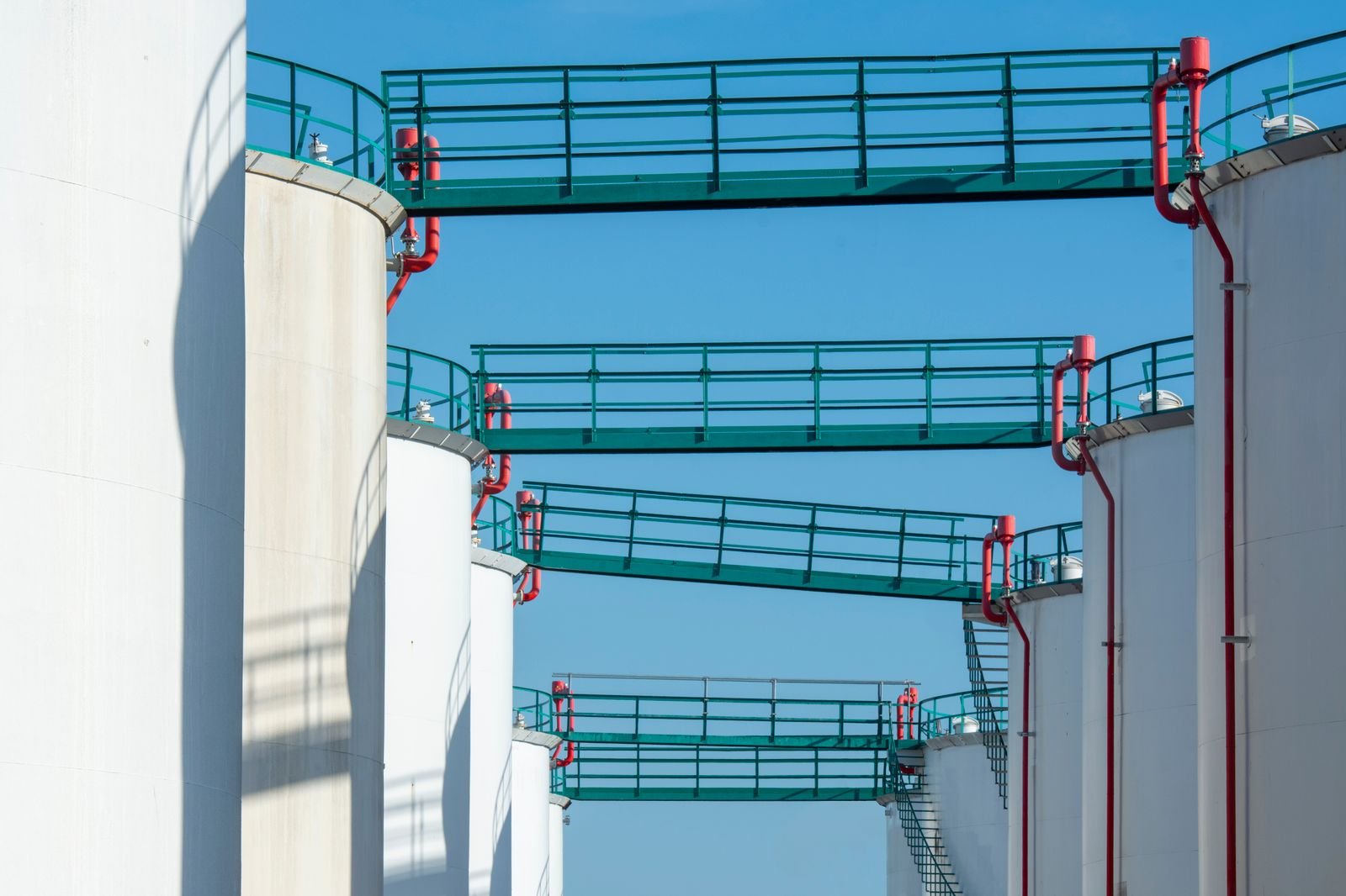 Industrial chemical storage tanks and process walkways